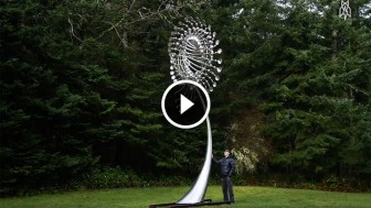 He Stands By His Giant Sculpture. Now Watch When The Wind Starts to Blow! Astonishing!