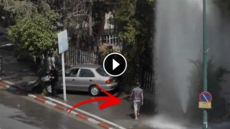 Car Hits A Fire Hydrant, Then This Guy Walks Onto The Scene And Does Something No One Expected!