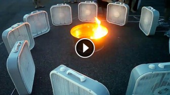 He Puts Some Fans Around A Campfire. When He Turns Them All On? Mind-Blowing!