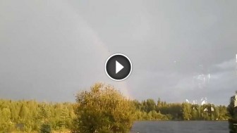 A Lady Was Casually Filming A Rainbow When This Happened!