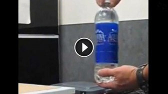 Beware! Never Help Others At The Airport By Holding Their Water Bottle