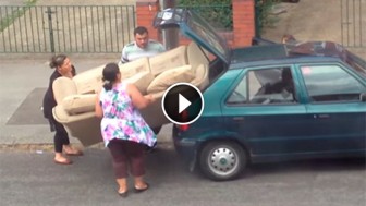 These People Tried To Fit a Sofa In a Tiny Car. This Is Every Bit As Stupid As It Looks